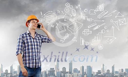 Image of man engineer talking on mobile phone Image of man engineer talking on mobile phone