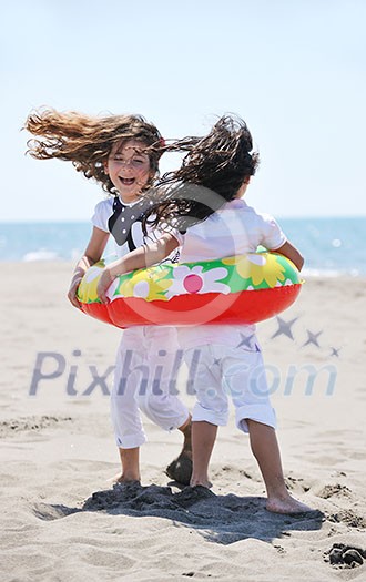 group of happy child on beach who have fun and play games group of happy child on beach who have fun and play games