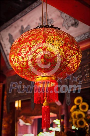 Red traditional Chinese lantern in street