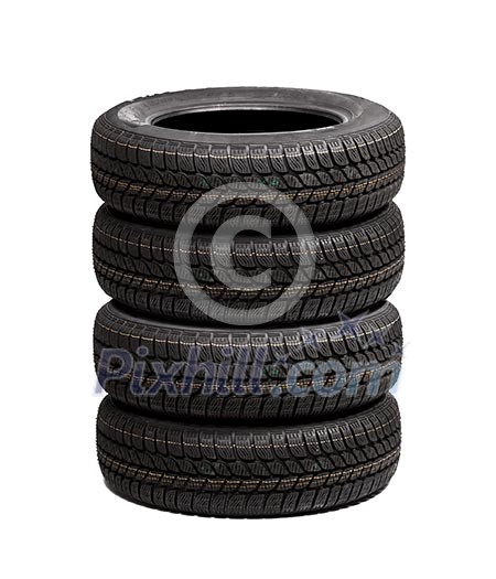 Set of winter car tires isolated on white background