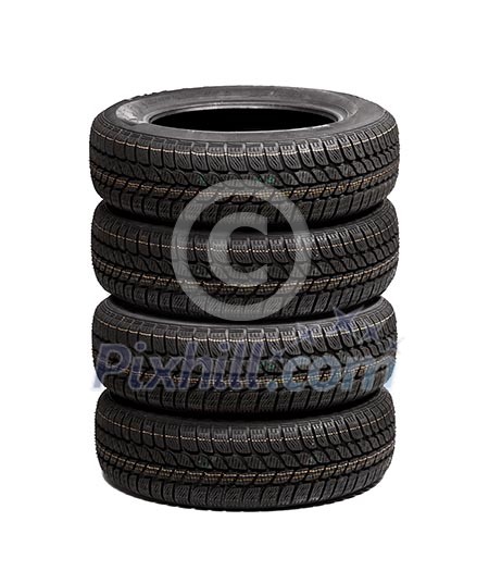 Set of winter car tires isolated on white background Set of winter car tires isolated on white background
