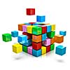 Business teamwork internet communication concept - colorful color cubes assembling into  cubic structure isolated on white with reflection