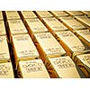 Banking finance concept background - stacks of gold bars close up