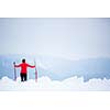 Cross-country skiing: young woman cross-country skiing on a  winter day (motion blurred image)