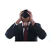 Portrait of a young business man looking depressed from work isolated over white background in studio