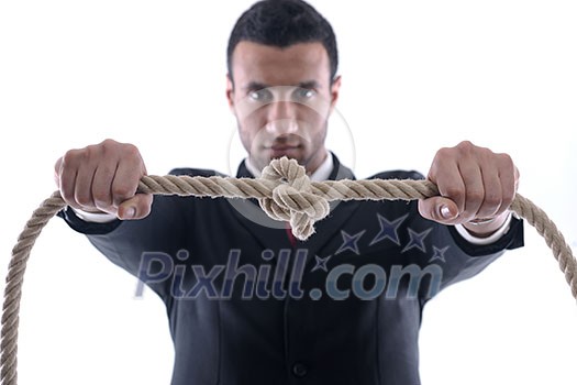 Business man pulling and bond tied with rope concept isolated on white background in studio Business man pulling and bond tied with rope concept isolated on white background in studio