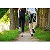 Young couple jogging in park at morning. Health and fitness concept