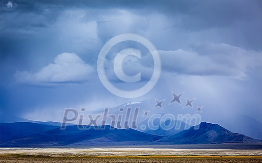 Gathering storm in Himalayas mountains. Ladakh, India Gathering storm in Himalayas mountains. Ladakh, India