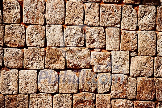 Texture of stone wall of ancient Mayan pyramids in Uxmal, Mexico Texture of stone wall of ancient Mayan pyramids in Uxmal, Mexico