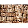 Texture of stone wall of ancient Mayan pyramids in Uxmal, Mexico