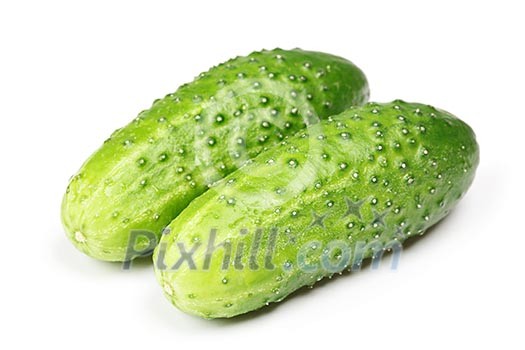 Two green cucumbers isolated on white background Two green cucumbers isolated on white background