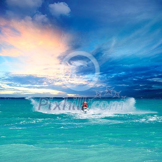 Man riding jet ski in Caribbean sea Man riding jet ski in Caribbean sea