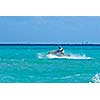 Man riding jet ski in Caribbean sea