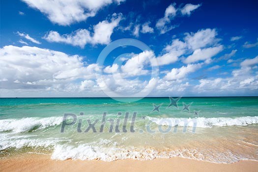 Beautiful beach and  waves of Caribbean Sea