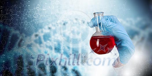 Close up image of human hand holding test tube. Science concept Close up image of human hand holding test tube. Science concept