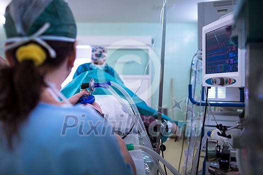 Anesthesia - patient under narcosis, breathing through a mask during surgery