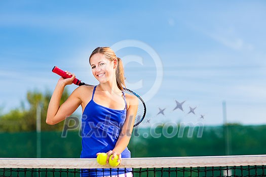 Portrait of a pretty young tennis player with copyspace