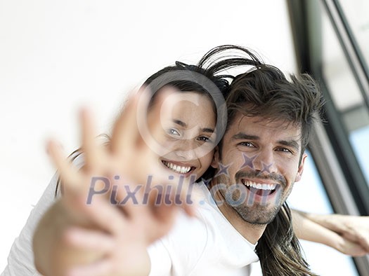 romantic happy young couple relax at modern home indoors and have fun