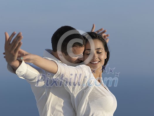 happy young romantic couple have fun relax smile at modern home outdoor terace balcony terace happy young romantic couple have fun relax smile at modern home outdoor terace balcony terace
