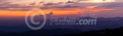 Panorama of sunset in mountains. Munnar, Kerala, India