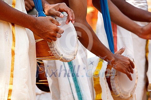 Drummers playing on drums