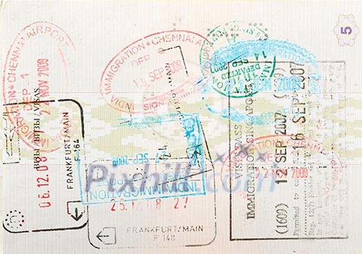 Passport page with immigration stamps close up