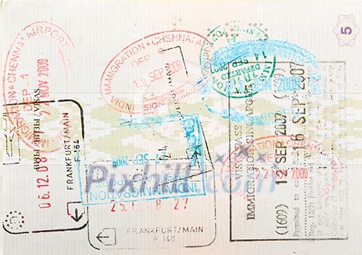 Passport page with immigration stamps close up Passport page with immigration stamps close up