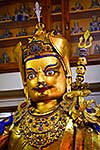 Gilded statue of Guru Padmasambhava in Tsuglagkhang temple. McLeod Ganj, Himachal Pradesh, India