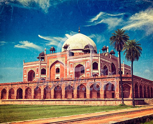 Vintage retro hipster style travel image of Humayun's Tomb with overlaid grunge texture. Delhi, India