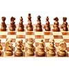 Wooden chess pieces on chessboard. Selective focus, shallow depth of field