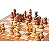 Wooden chess pieces on chessboard. Selective focus, shallow depth of field