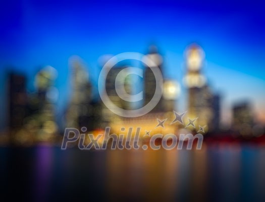 Blurred background of Singapore skyline in evening Blurred background of Singapore skyline in evening