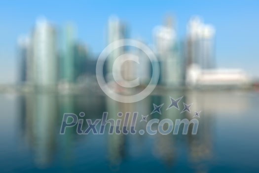 Modern city defocused blurred background - Singapore business district skyscrapers and Marina Bay in day