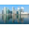 Modern city defocused blurred background - Singapore business district skyscrapers and Marina Bay in day