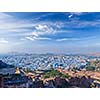 Aerial panorama of Jodhpur, also known as Blue City due to the vivid blue-painted Brahmin houses. View from Mehrangarh Fort part of fortifications is also visible.  Jodphur, Rajasthan, India