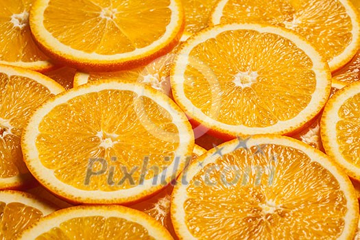 Colorful orange citrus fruit slices background Colorful orange citrus fruit slices background