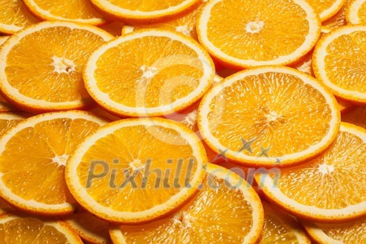 Colorful orange citrus fruit slices background Colorful orange citrus fruit slices background