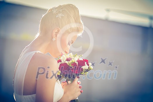 Gorgeous bride on her wedding day (color toned image; shallow DOF)