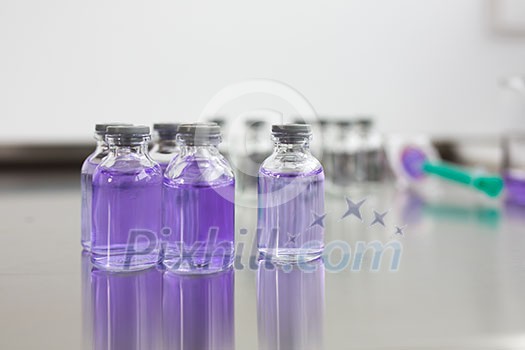 Flasks with liquids in a lab Flasks with liquids in a lab
