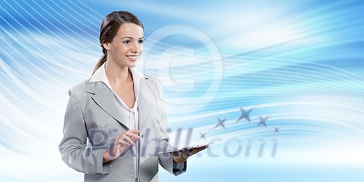 Attractive smiling businesswoman holding tablet pc in hands Attractive smiling businesswoman holding tablet pc in hands