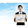 Handsome businessman holding frame with business sketches