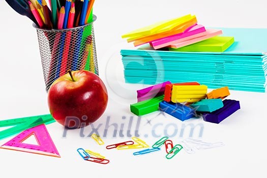Colored pencils plasticine papers and other school items