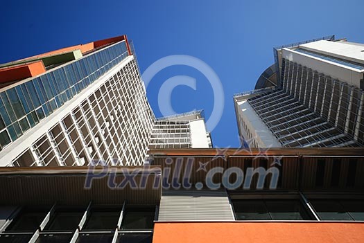 modern building at sunny day and clear blue sky
modern building at sunny day and clear blue sky