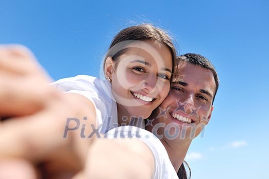 happy young romantic couple in love have fun running and relaxing on beautiful beach