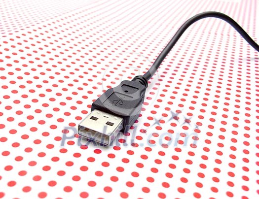 usb cable on dotted background