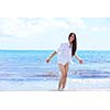 beautifel and happy woman girl on beach have fun and relax on summer vacation  over the beautiful tropical sea