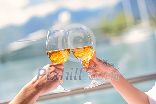 happy young couple having lanch at beautiful restaurant on by the sea on  beach