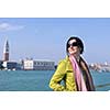 Beautiful tourist woman in Venice, exploring the old city