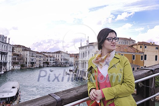 Beautiful tourist woman in Venice, exploring the old city Beautiful tourist woman in Venice, exploring the old city