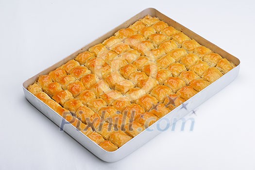 traditional dessert turkish baklava,well known in middle east and delicious isolated on white background traditional dessert turkish baklava,well known in middle east and delicious isolated on white background